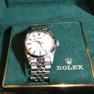 Vintage Rolex and Cartier watches each 2500